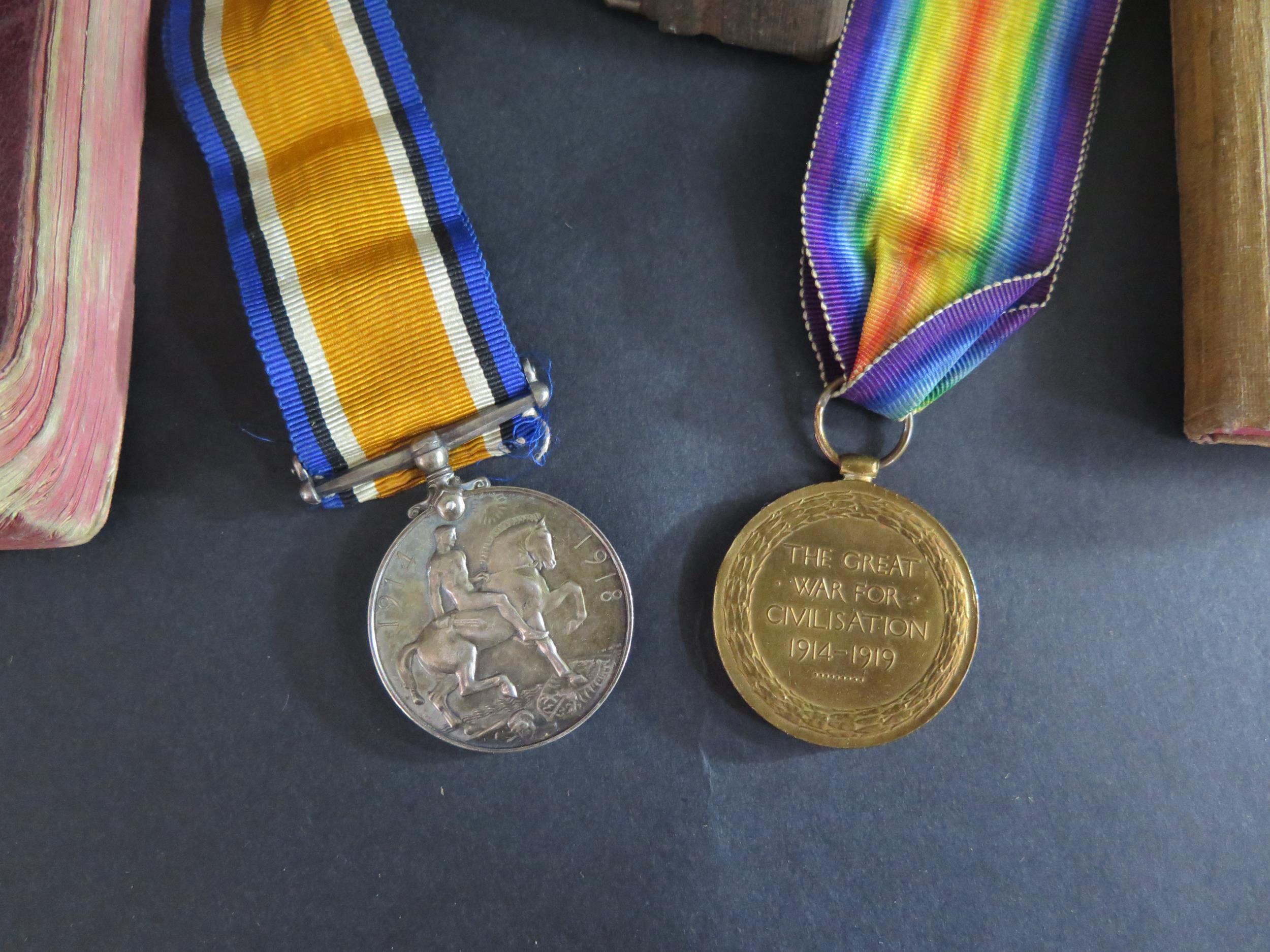 A WWI Two Medal Group awarded to 45440 PTE. G. NOON. H.L.I., a Christmas 1914 tin with piece of - Image 2 of 3