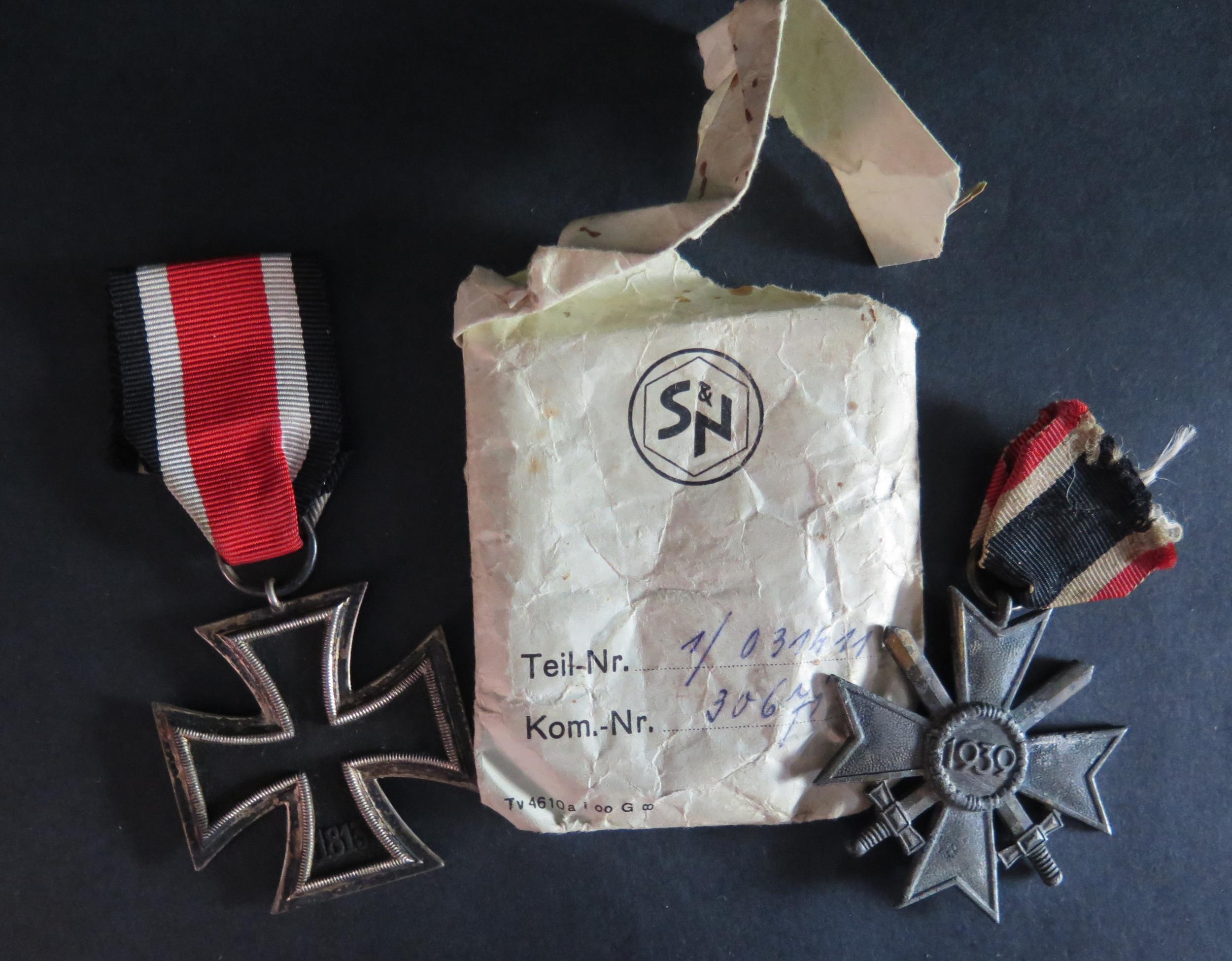 A WWII German Iron Cross Second Class in paper sleeve and War Merit Cross Second Class - Image 2 of 2