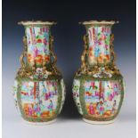 A Pair of 19th Century Cantonese Export Ware Famille Rose Vases with applied gilt dragons, 42cm