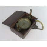 A 19th Century Boxed Brass Surveyor's Compass, the 5" silver dial signed R. Watson of Newcastle