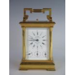 A Modern L'Epée Gilt Brass Repeating Carriage Clock with calendar and alarm with bevelled glass
