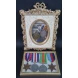 A Father & Son Medal Groups including WWI medal pair awarded to J. 54328 G.H. BEARD. A.B. R.N.