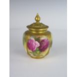 A Royal Worcester Potpourri Vase with reticulated cover and decorated with roses, 1922 model 162, 12