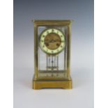 A 19th Century Brass Four Glass Mantle Clock signed P. PLANTIER FILS LISBOA and with mercury