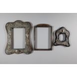 Three Silver Photograph Frames, largest aperture 5.25"x3.25". Easel backs missing