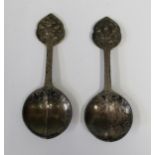 A Pair of 19th Century Mongolian? White Metal Medicine Spoons with embossed and chased decoration,