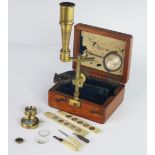 A 19th Century Frederick Cox Optical Brass Magnifying Instrument and Slides and with original box