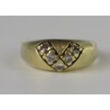 A 14K Gold and Diamond, the five stone arranged in a V, size L, 4.6g