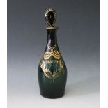 A Georgian Green Glass BRANDY Decanter with lozenge shaped stopper and gilt swag decoration,