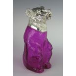 A Pink Glass Bear Decanter with silver plated mount and having a hinged mouth, c. 22cm high