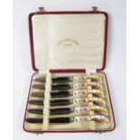 A Cased Set of Royal Crown Derby Porcelain Hadled Tea Knives