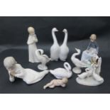 Four Lladro and Four Nao Ornaments