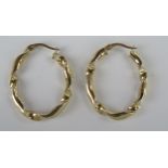A Pair of Large 9ct Gold Oval Twist Hoop Earrings, 33mm overall height, 2g
