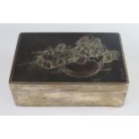 A Japanese .950 Silver Mounted Cigarette Box decorated with various seated figures including a