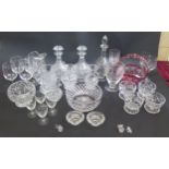 A Large Selection of Cut Crystal including a cranberry overlay basket, decanters and other glassware