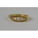 An Antique 18ct Yellow Gold and Diamond Five Stone Ring, central stone c. 2.9mm, Birmingham 1912,
