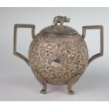 An Unmarked Indian Silver Two handled Oval Pot and Cover with elephant finial and with profuse