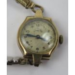 A Ladies OMEGA 9ct Gold Wristwatch, 15 jewel mechanical movement no. 8390796 and on a rolled gold