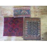 Two Small Persian Style Rugs and cushion, largest rug 54 x 50cm