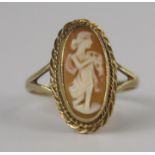 A 9ct Gold Shell Cameo Ring decorated with full length female figure, 19x11mm head, size P, 3.1g