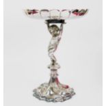 A Victorian Elkington Plate Table Centrepiece in the form of a putto bearing a dish with lobed