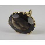 A Large 9ct Gold Smoky Quartz Ring, 25 x 18.5mm stone, size O.5, 10.8g