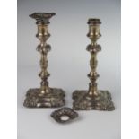 A Pair of Victorian Loaded Silver Candlesticks, Sheffield 1840, Henry Wilkinson, c. 23cm. A/F