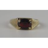 A 9ct Yellow Gold and Garnet Ring, 9x7mm stone, size R, 3.3g