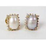 A Pair of 22K Yellow Gold, Pearl and Diamond Stud Earrings12 x 10mm head, 5.6g