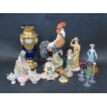 A Selection of Decorative Ornaments including a Royal Crown Derby Robin, Nao, Capo Di Monte,