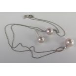 An 18ct White Gold and Pearl Pendant and Earring Set on a matching 17" chain, pendant 24mm drop, 4.