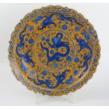 Chinese Porcelain Dish with underglaze blue dragon decoration and enamel yellow ground, Qianlong six