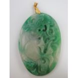 Large Chinese Jadeite Pendant decorated with a fish and flower to the reverse, stone 84x57mm, 107g