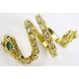 Emerald and Diamond Snake Ring with ruby eyes with an unmarked 18ct gold setting, size P.5 -K.5,