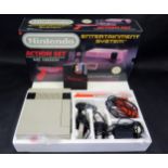 Nintendo NES Entertainment System Action Set - comes with orange zapper, two controllers, and