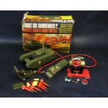 A Tri-ang Minic M310 Shoot or Surrender Rocket Gun & Tank Battle Remote Control Command Set (box