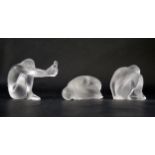 Three Modern Lalique Female Nude Ornaments, largest 9cm long