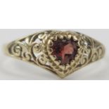 9ct Gold and Garnet Ring with a heart shaped head and pierced foliate shoulders, size Q, 1.6g