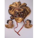 Lele Nason of Venezia Mask and two cupid caved wooden and painted busts