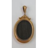 9ct Gold Locket with twin glazed panels, maker AJS, 52mm drop, 6.7g