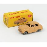 A Dinky Toys 160 Austin A30 Saloon in pale beige with smooth solid grey plastic wheels in correct