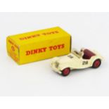 A Dinky Toys 108 MG Midget Sports in cream with red-maroon interior, red hubs RN '28', white