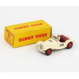 A Dinky Toys 108 MG Midget Sports in cream with red-maroon interior, red hubs RN '28', white