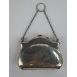 Unmarked Silver Evening Purse with chased ribbon and harebell decoration with leather fitted