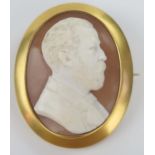 Large Victorian Shell Cameo Brooch decorated with a high relief bust of a gentleman and in a heavy