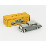 A Dinky Toys 150 Rolls-Royce Silver Wraith in two tone grey and spun hubs in type 2 yellow picture