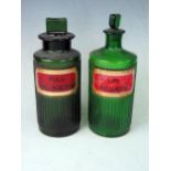 Two Victorian Green Glass Chemist's Bottles _ LIN: BELLAD:M: 9 (23cm) and PULV: SAL: ACETOS
