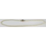 17.25" Cultured Pearl Necklace with 9ct gold and sapphire clasp, largest pearl 7mm, 16.4g