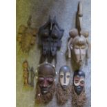 Six African Masks, bronze figure and carved figure