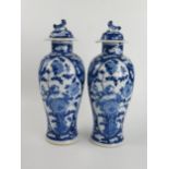 Pair of 18th Century Chinese Blue and White Vases with Covers, four character mark, 31.5cm